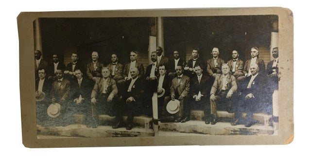 Item #82170 Booker T. Washington and Eleven Other Men, Probably at Tuskegee. [our title]. Stereo View Card.