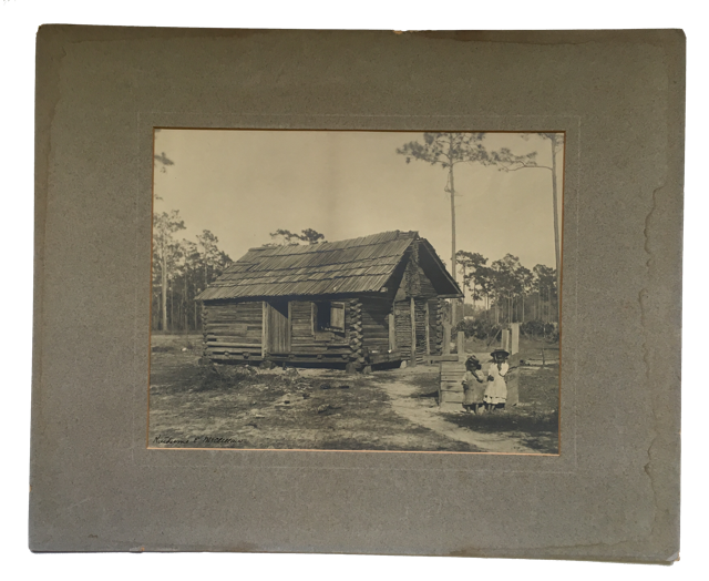 Item #82508 Photograph of Florida Log Cabin with three African American Children. Katherine Elizabeth McClellan.