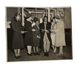 Item #92428 Photo of Canada Lee surrounded by Five Unidentified Women and a Boy. Photograph,...