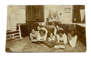 Item #93084 Photo on Postcard of Seven Young African American Women Lying on the Floor while...