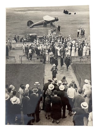 Four 1932 Amelia Earhart wire service photos in black and white accompanied by original descriptive text. All relate to her Solo Flight across the Atlantic Ocean to Europe